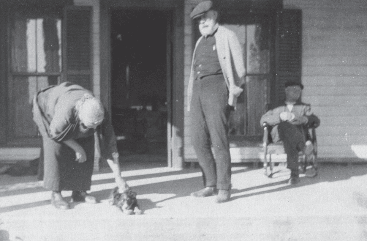 An Antique Photo of Three Individuals